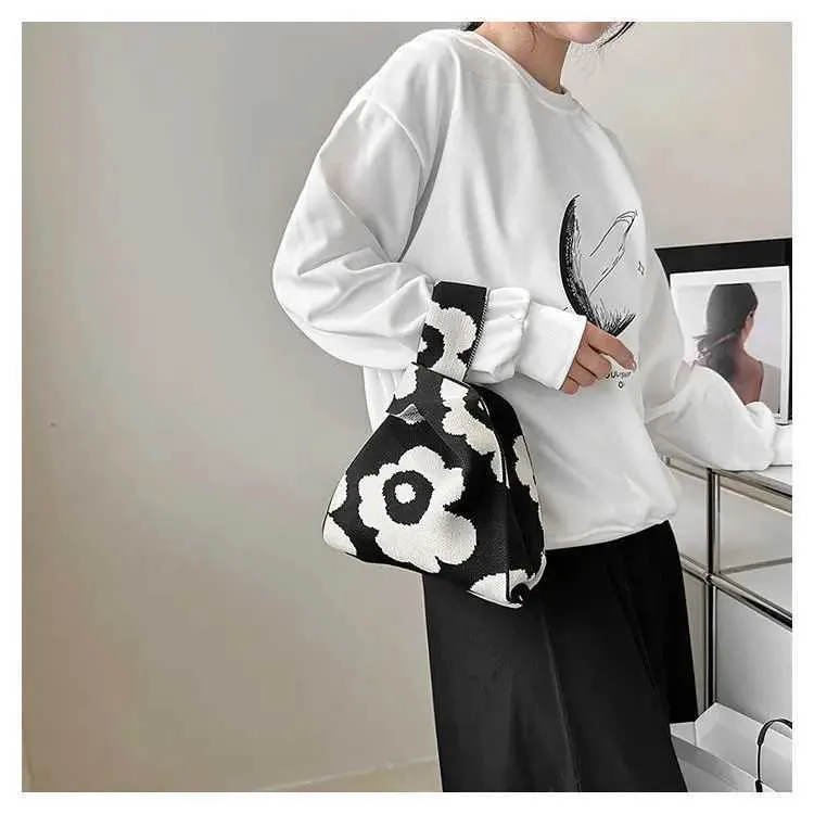 Borsa a mano in tela artistica giapponese di grande capacità, modello Geely, portafoglio con nodo casual e borsa da polso alla moda e versatile Wens_voghion.com