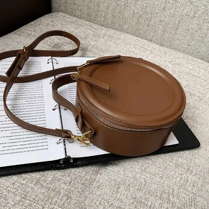 Sac à bandoulière de couleur unie pour petit sac à main rond pour femmes, sacs de créateurs de mode, sac à bandoulière en cuir, fermeture éclair pour femmes_voghion.com