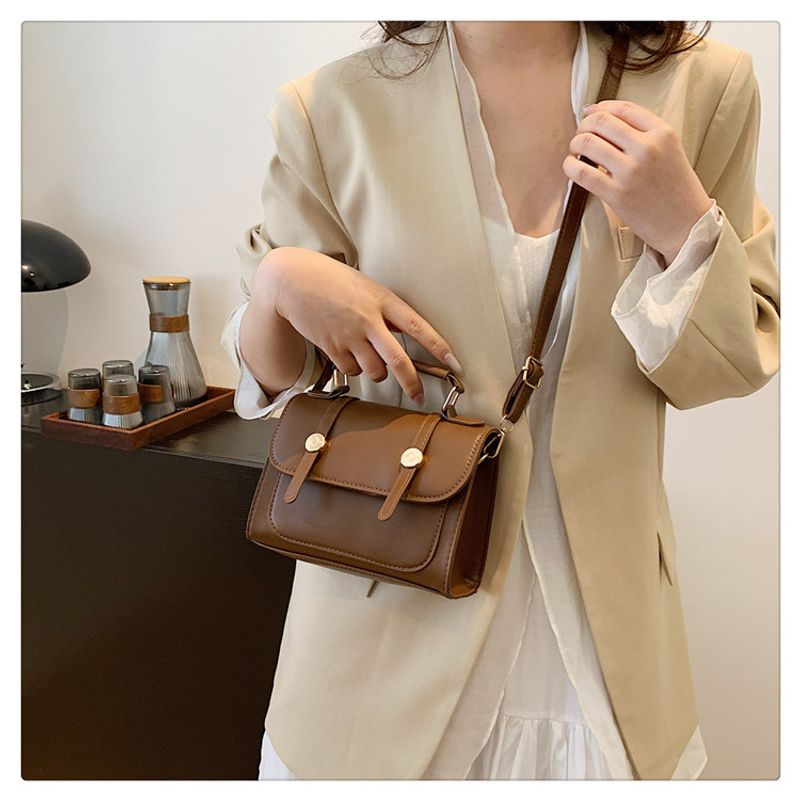 Britische Schulter für Frauen 2024 Neue trendige Studentin Multifunktionaler Rucksack Handheld Reisetasche_voghion.com