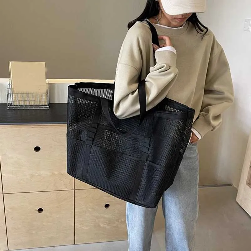 Hollow large capacity makeup storage womens multifunctional mesh shoulder travel transparent beach bag Y241011_voghion.com