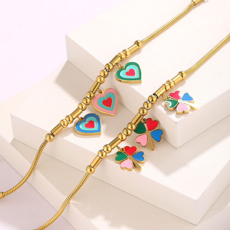 Bracciale personalizzato in acciaio inossidabile placcato oro con ciondolo a forma di quadrifoglio Dripping Love_voghion.com