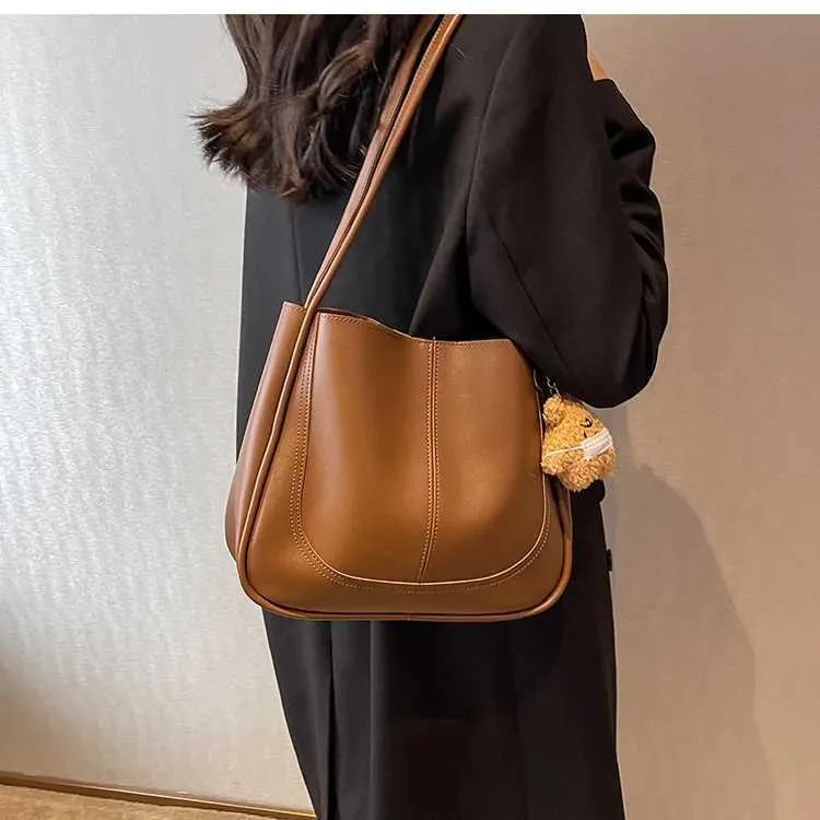 Bolso de hombro de alta gama con textura de gran capacidad, nuevo bolso de mano para mujer, otoño e invierno 2024, C241106_voghion.com