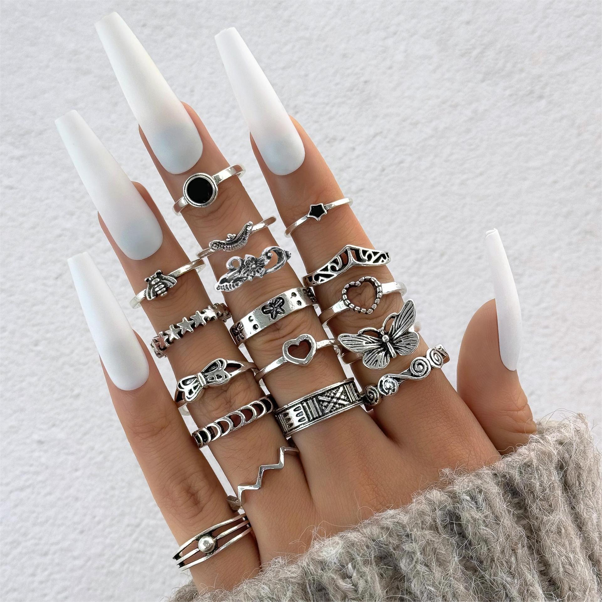 Conjunto de anéis geométricos com flor de lótus e girassol_voghion.com