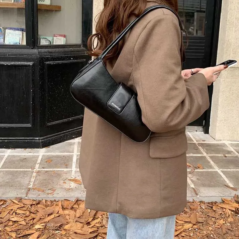 Fashion Shoulder Axillary Solid Color Niche Black Small Square Bag Leisure Versatile Lady Commuter Bags Crossbody_voghion.com