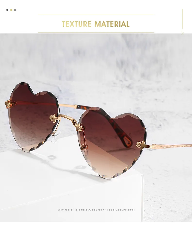 Hartvormige zonnebril dames randloze cat eye designer bril_voghion.com