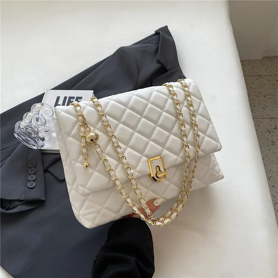 Elegante bolso bandolera acolchado de piel: bolso cruzado de diseño para mujer, con cadena grande, bolso elegante en blanco y negro._voghion.com