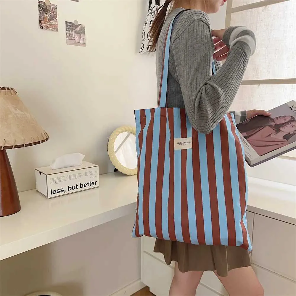 Vintage gestreifte warme Leinwand große Kapazität tägliche Einkaufstasche lässig tragbare Damen Reisehandtasche Y241109_voghion.com