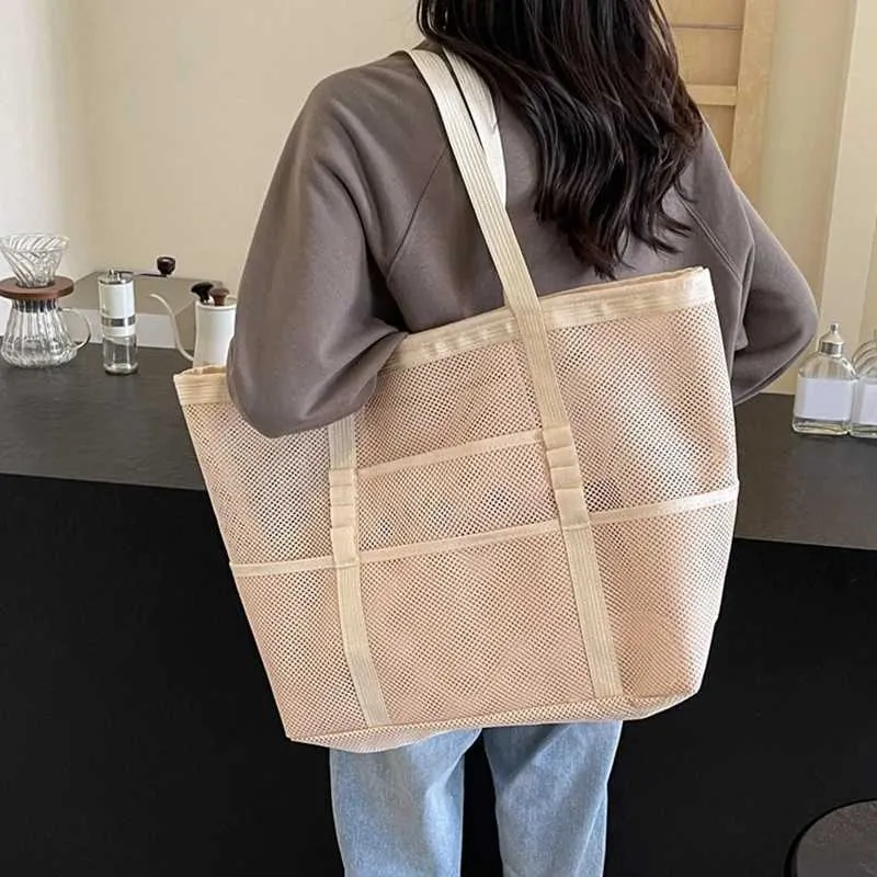 Hollow large capacity makeup storage womens multifunctional mesh shoulder travel transparent beach bag Y241011_voghion.com