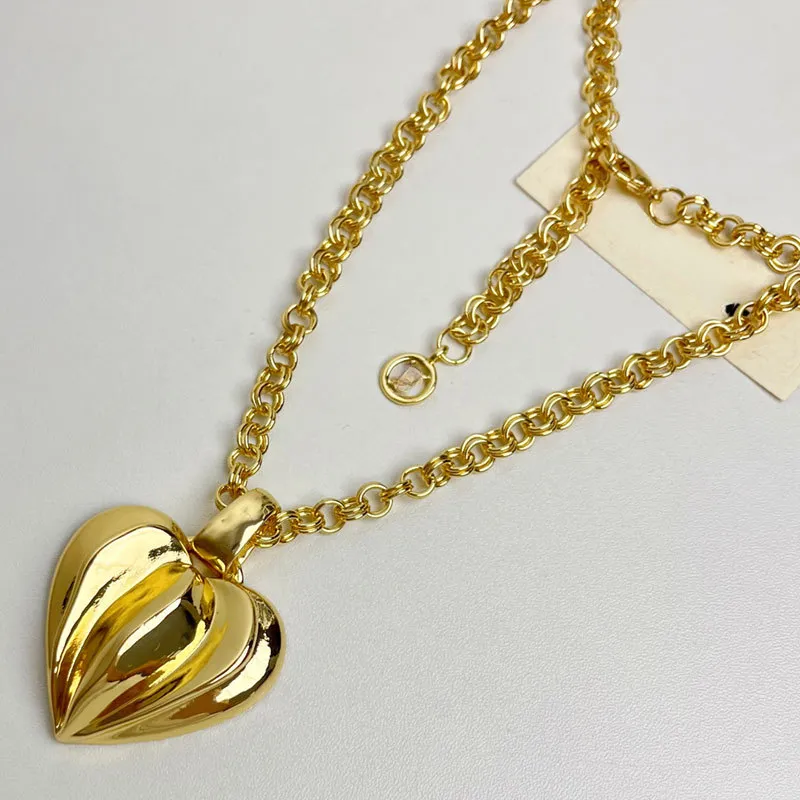 Collier avec pendentif en forme de cœur en métal doré pour femme, bijou tendance et vintage, idéal comme cadeau de fête_voghion.com