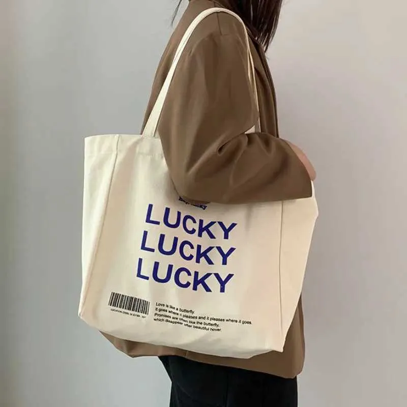 Large capacity retro letter printed canvas handbag with foldable design - perfect for casual shopping and daily use_voghion.com