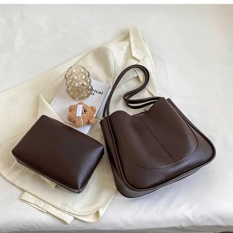 Bolso de hombro de alta gama con textura de gran capacidad, nuevo bolso de mano para mujer, otoño e invierno 2024, C241106_voghion.com