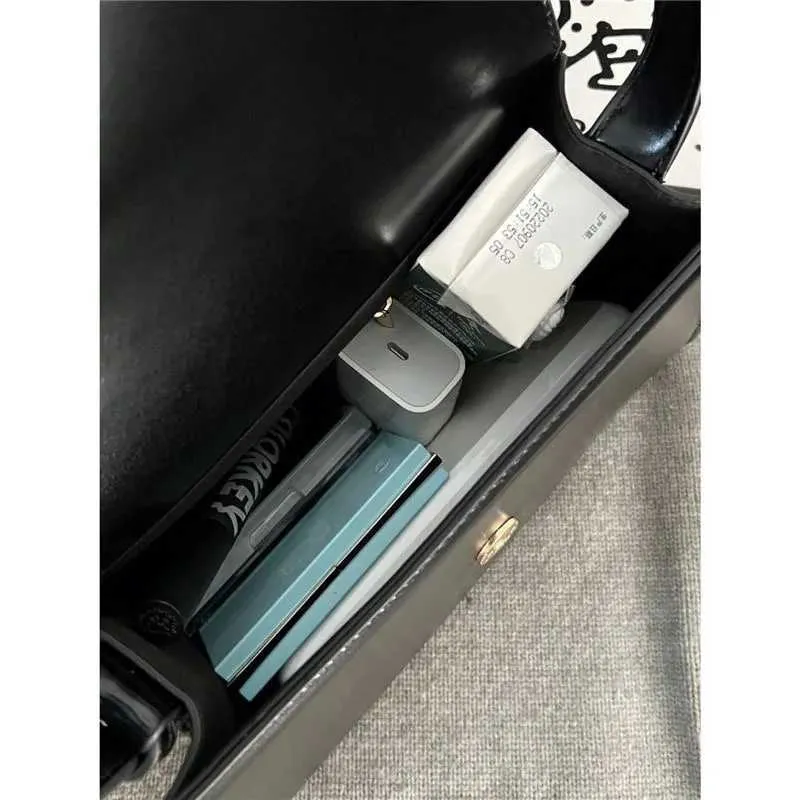 Black PU Leather Single Shoulder 2023 New Womens Buckle High Capacity Underarm Bag Designer Advanced Texture Ladies_voghion.com