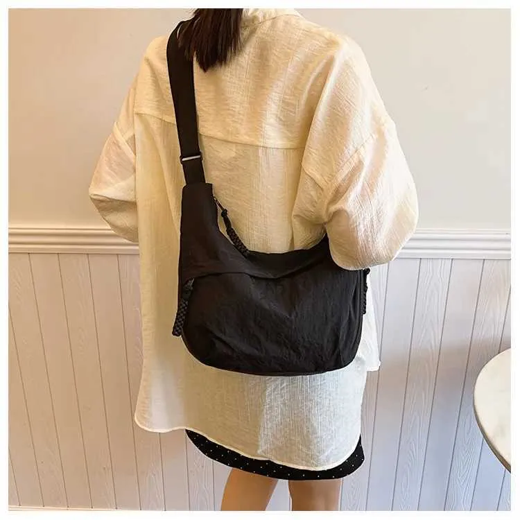 Version coréenne à la mode et minimaliste dumpg populaire cette année, nouveau sac à bandoulière de haute qualité, fourre-tout de grande capacité_voghion.com