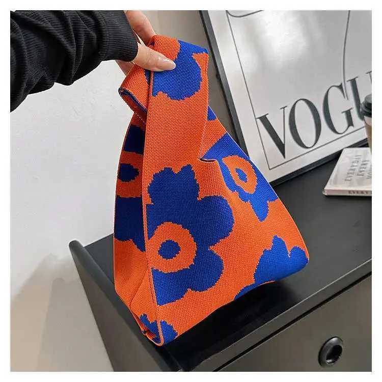 Borsa a mano in tela artistica giapponese di grande capacità, modello Geely, portafoglio con nodo casual e borsa da polso alla moda e versatile Wens_voghion.com