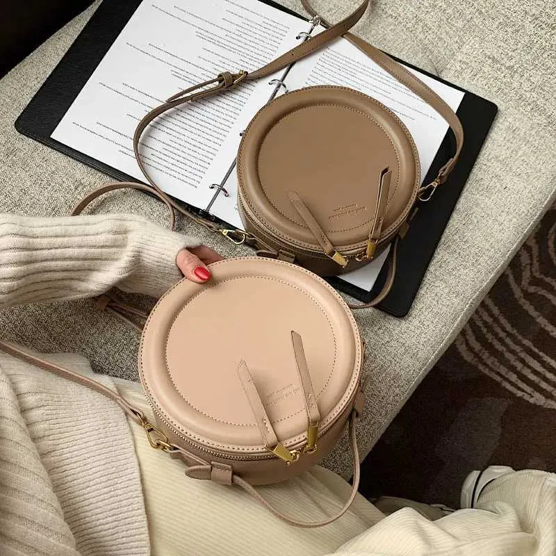 Sac à bandoulière de couleur unie pour petit sac à main rond pour femmes, sacs de créateurs de mode, sac à bandoulière en cuir, fermeture éclair pour femmes_voghion.com