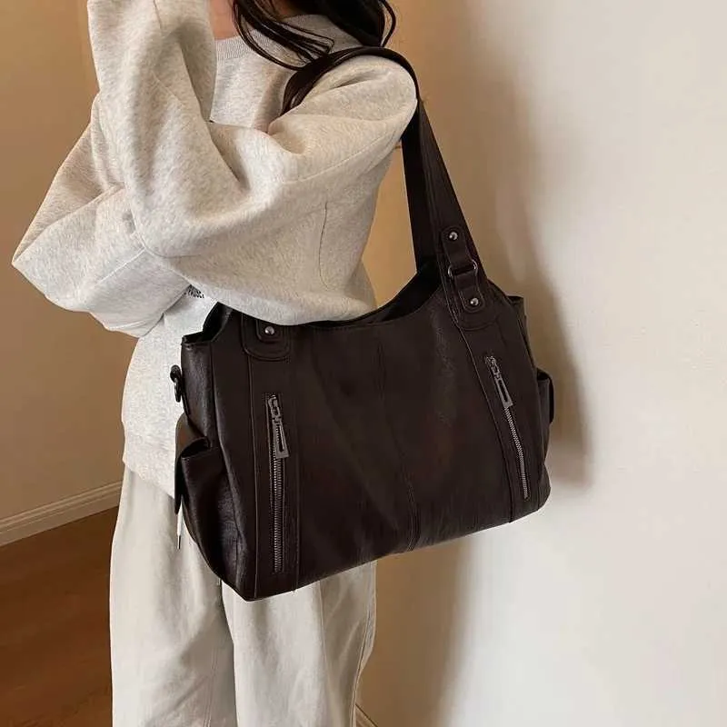 Sacs à bandoulière à compartiment intérieur souple 2024 de haute qualité aux couleurs contrastées pour femmes Mode Fermeture éclair Pu Femmes_voghion.com