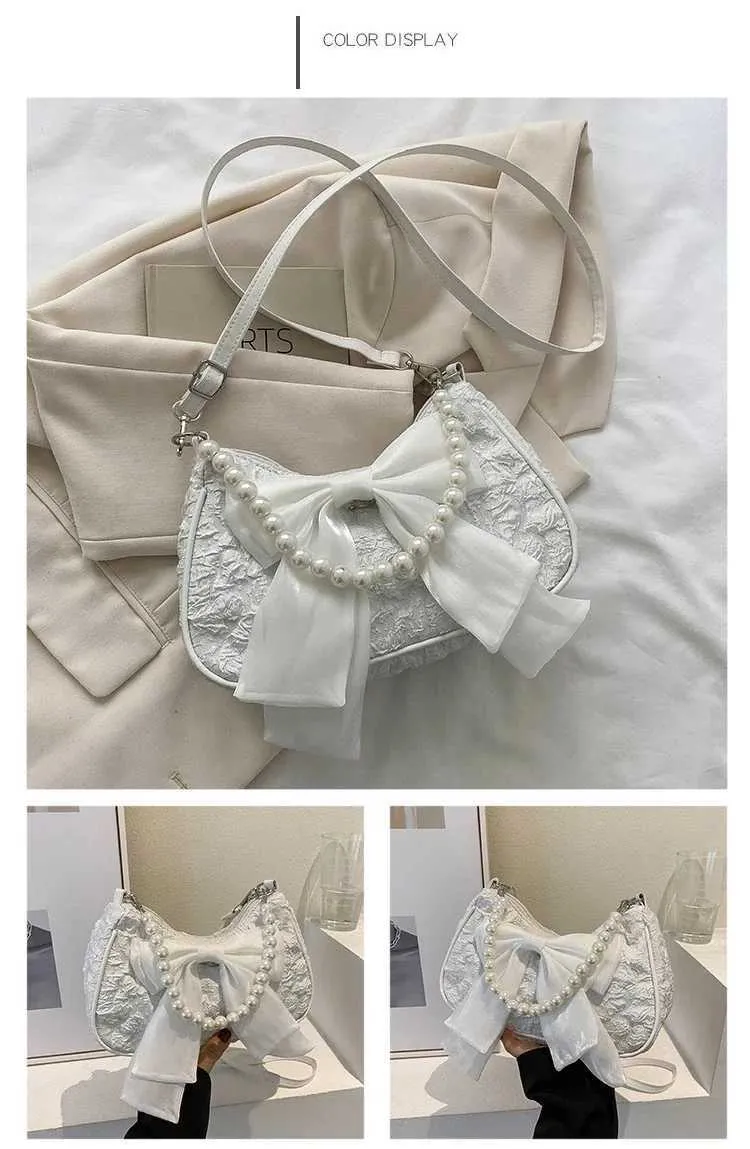 Bolsa de ombro e tiracolo feminina com pérolas e laço_voghion.com