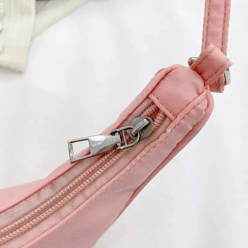 Wens Nyl Shoe 2023 Fi Solid Canvas Dumpg Unterarm Designer Tasche Cluh Geldbörse und Handtasche Y241026_voghion.com