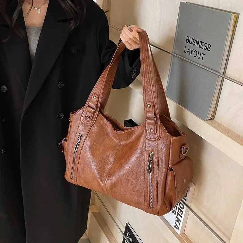 Sacs à bandoulière à compartiment intérieur souple 2024 de haute qualité aux couleurs contrastées pour femmes Mode Fermeture éclair Pu Femmes_voghion.com