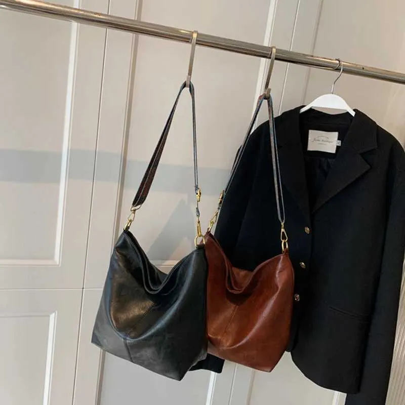 Borsa a tracolla vintage tinta unita in pelle PU da donna alla moda, con tracolla larga e semplice, a secchiello, a tracolla Ba241216_voghion.com