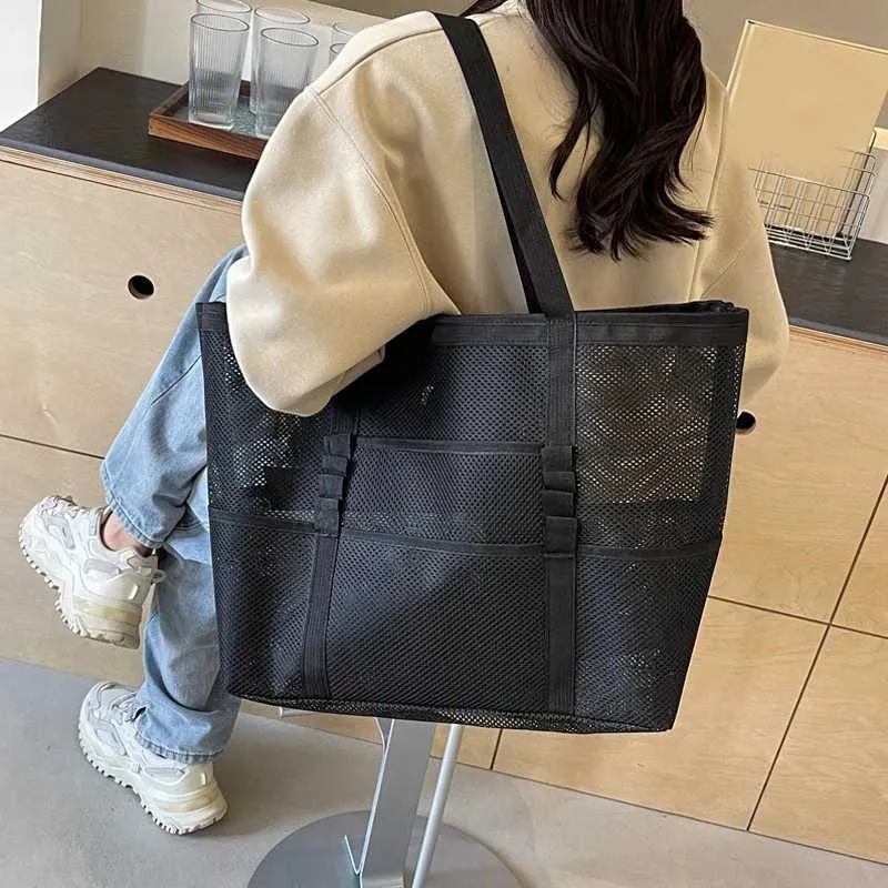 Bolsa de praia transparente de viagem de ombro de malha multifuncional feminina de grande capacidade de armazenamento de maquiagem Y241011_voghion.com