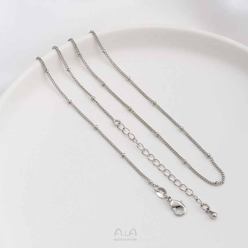 Catena di estensione a goccia d'acqua con perlina piatta O in acciaio JF14K con finitura in oro vero, colore preservato, clavicola da 45 cm_voghion.com