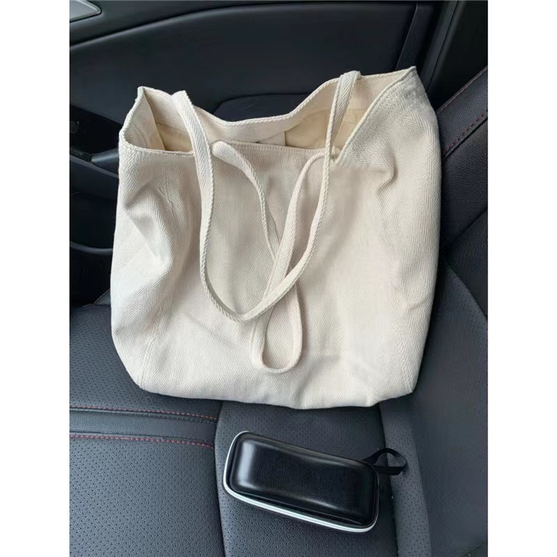 2024 New Handheld Single Simple Commuting Canvas Women's Twill Tote Casual Korean Edition Large Capacity Shoulder Bag_voghion.com