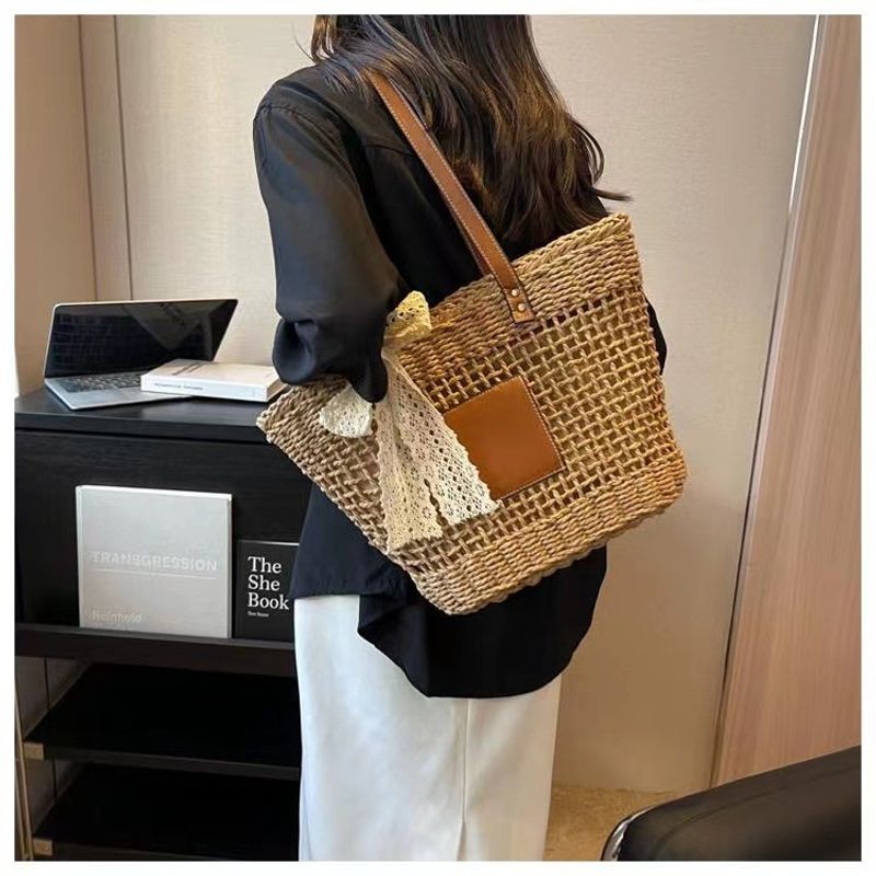 hollow shoulder new simple straw woven holiday style beach versatile women's bag_voghion.com