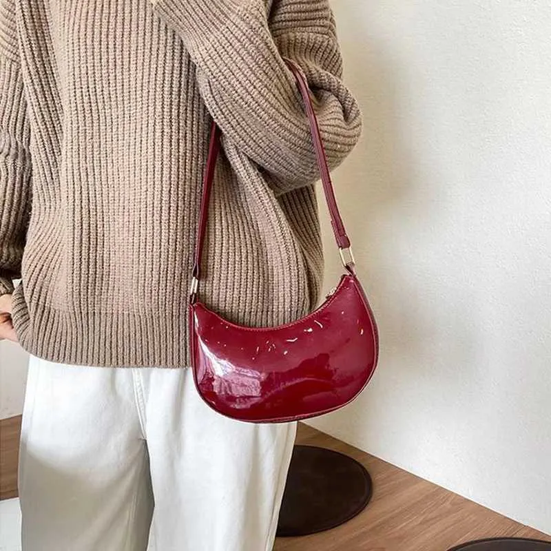 Designer Bag Fashionable new solid color bright textured light handheld zipper cross shaped bag Y241115_voghion.com