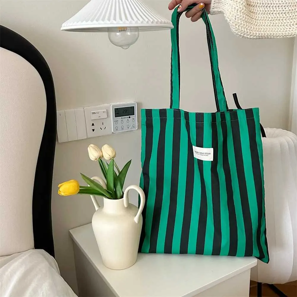 Vintage gestreifte warme Leinwand große Kapazität tägliche Einkaufstasche lässig tragbare Damen Reisehandtasche Y241109_voghion.com