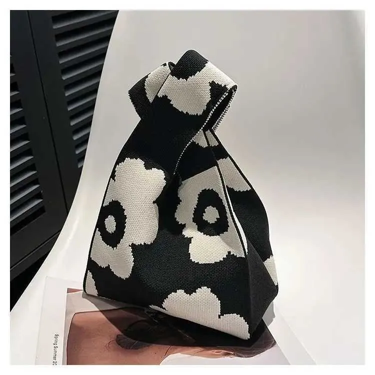 Borsa a mano in tela artistica giapponese di grande capacità, modello Geely, portafoglio con nodo casual e borsa da polso alla moda e versatile Wens_voghion.com