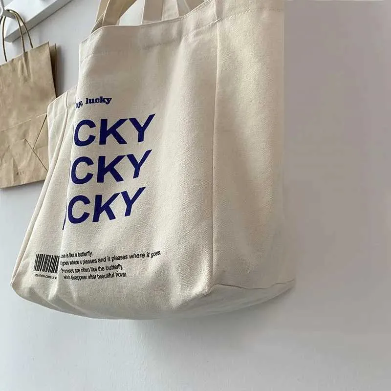 Large capacity retro letter printed canvas handbag with foldable design - perfect for casual shopping and daily use_voghion.com