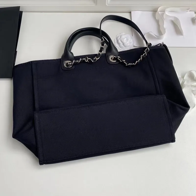 Designer-Tasche aus Segeltuch mit Perlengriff | Klassische Modehandtasche 2024_voghion.com
