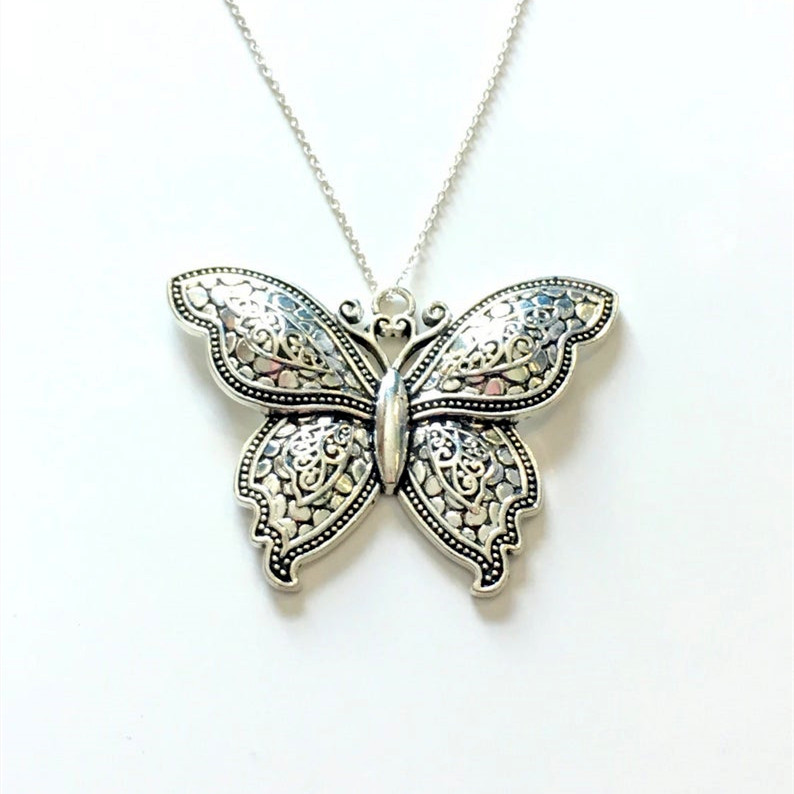 Collane Collana vintage con libellula, farfalla, elefante e serpente_voghion.com