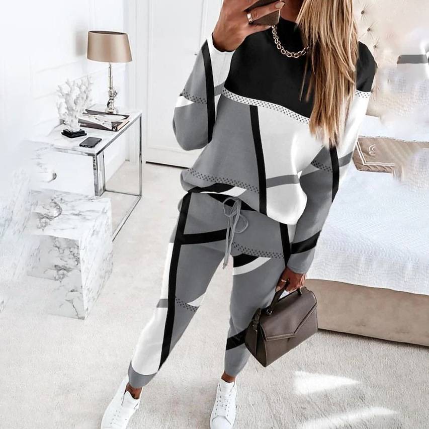 Ensemble de survêtement pour femmes européennes 2024 Nouveau ensemble de costume de mode décontracté à manches longues et col rond à imprimé de couleurs contrastées en deux pièces