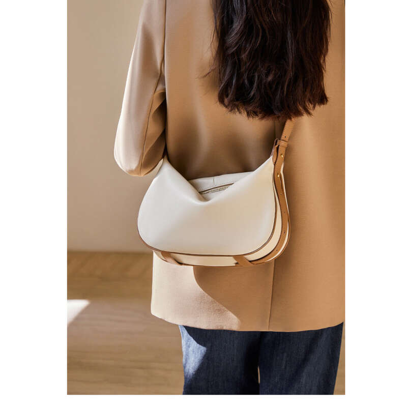 2025 Neue Frühjahrs- und Sommer-Hundert-High-End-Feeling-Knödeltasche Crossbody-Leder-Damen-Umhängetasche_voghion.com