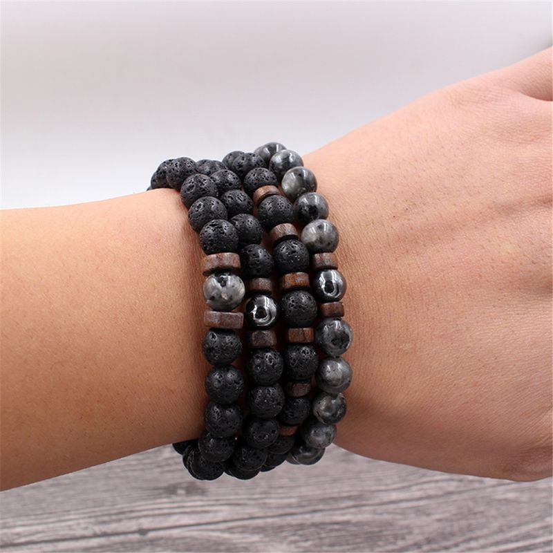 Armband mit glänzendem Vulkan-Schwarzeisenstein und Persönlichkeit für Paare im gleichen Stil_voghion.com