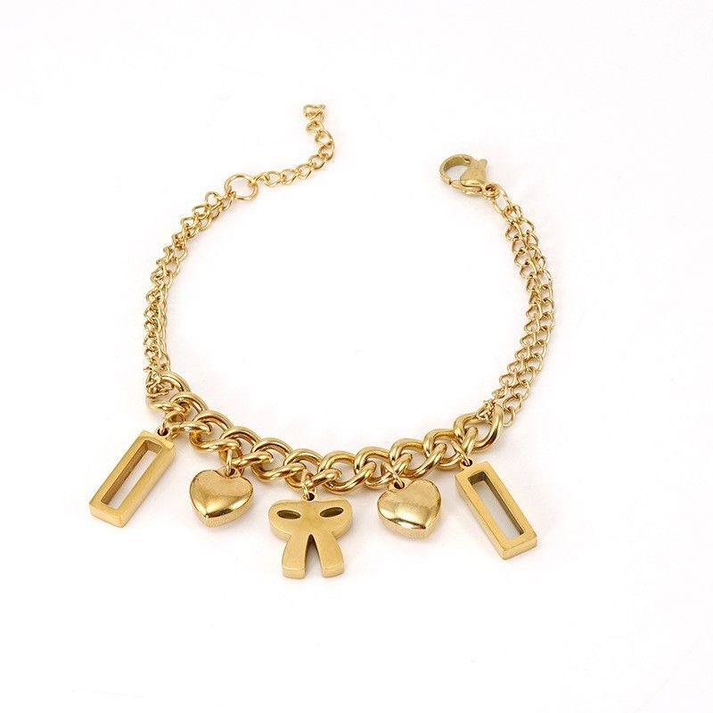 Braccialetto alla moda in acciaio inossidabile con combinazione di titanio, dorato, geometrico, design di nicchia per le donne_voghion.com