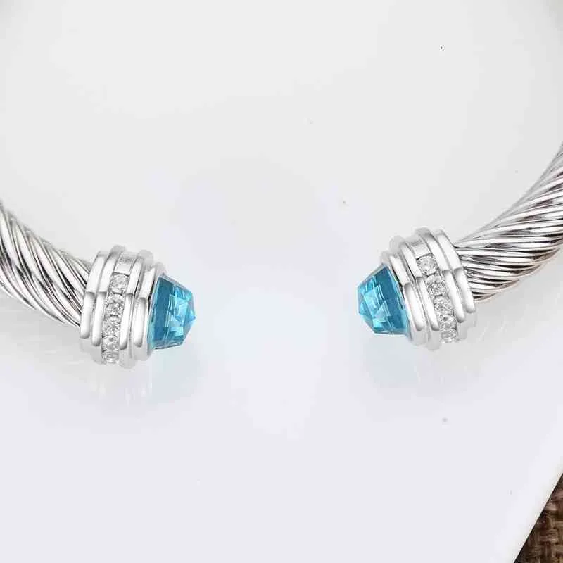Flätat öppet armband för kvinnor och män design smycken mode_voghion.com