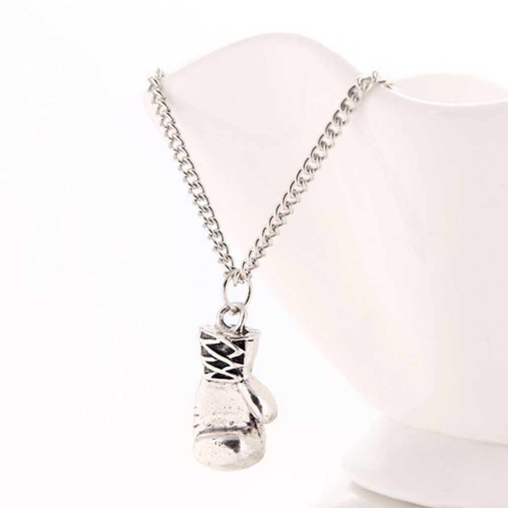 Collier avec pendentif en acier inoxydable représentant des gants de boxe pour homme et femme_voghion.com