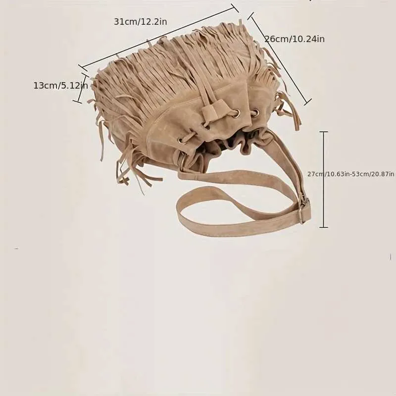 Borsa a secchiello morbida in velluto da donna con nappa e tracolla_voghion.com