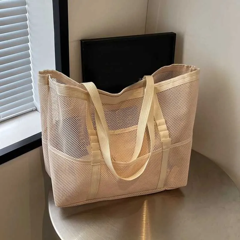 Hollow large capacity makeup storage womens multifunctional mesh shoulder travel transparent beach bag Y241011_voghion.com