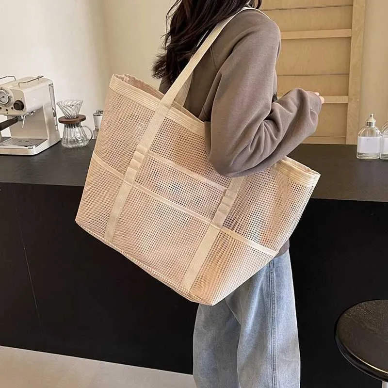 Hollow large capacity makeup storage womens multifunctional mesh shoulder travel transparent beach bag Y241011_voghion.com