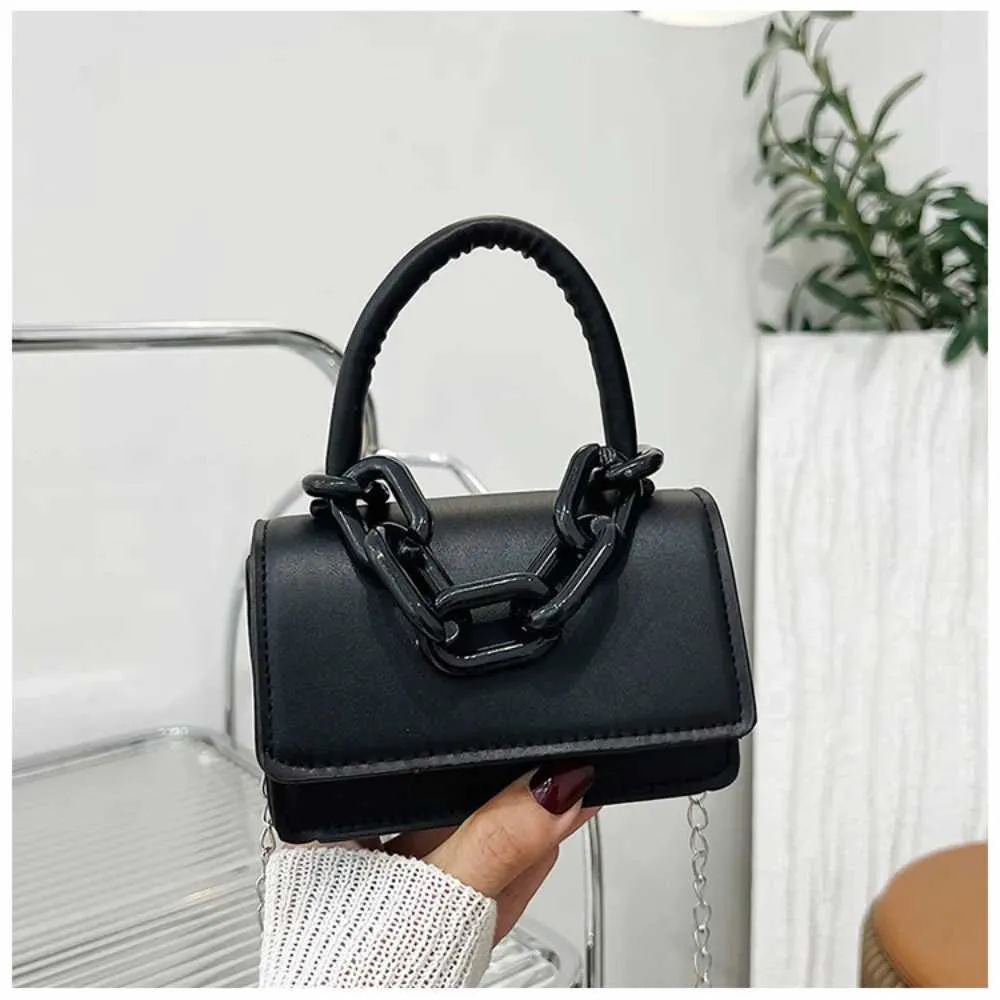 Designer 2024 Femmes Horizontal Édition Coréenne Chaîne Petit Carré Mode Mini Sac À Bandoulière Flip Boucle Sac À Main Portefeuille_voghion.com