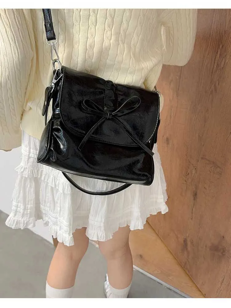 Stylish Women's Crossbody Shoulder Bag With Bows And Flap Closure_voghion.com