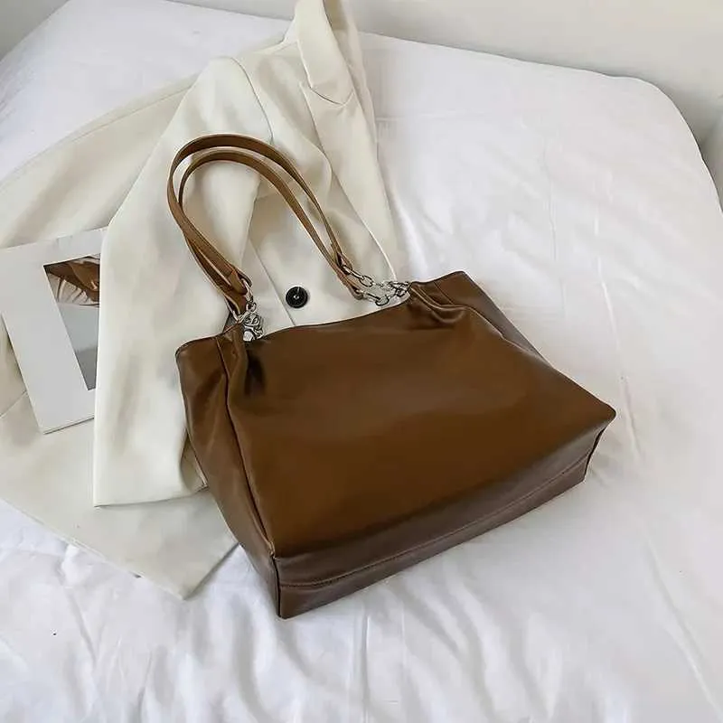 Sacs à bandoulière pour femmes Vintage Couleur unie Simple Grande capacité Grand cuir PU Les derniers sacs à main de voyage_voghion.com