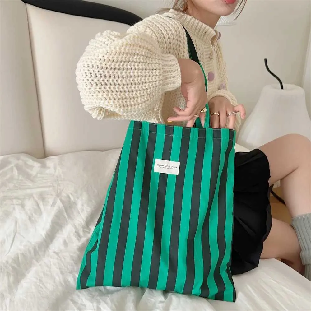 Vintage gestreifte warme Leinwand große Kapazität tägliche Einkaufstasche lässig tragbare Damen Reisehandtasche Y241109_voghion.com