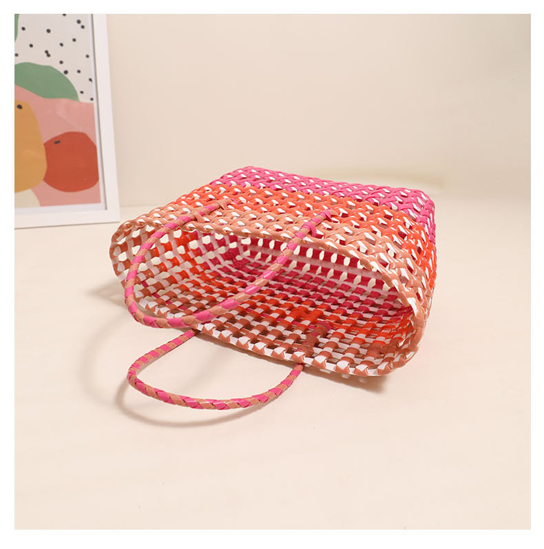 Grenzüberschreitende heiß verkaufte bunte gewebte Plastiktasche, neue hohle handgewebte Strohtasche, Urlaubsstrandtasche, vielseitiger Gemüsekorb_voghion.com