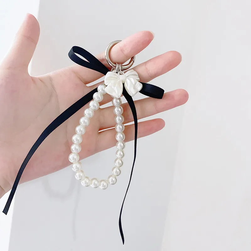 Portachiavi con fiocco in nastro, perline e perle, bianco latte, con nodo a farfalla, ciondolo per borsa da bambina, ciondoli per zaino, decorazioni e regali._voghion.com