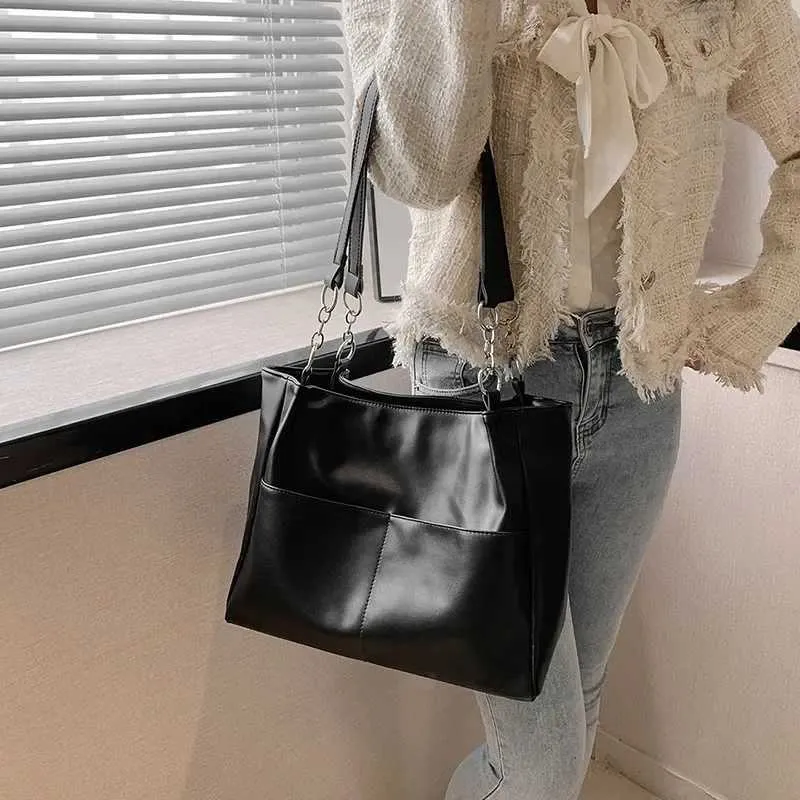 Sacs à bandoulière pour femmes Vintage Couleur unie Simple Grande capacité Grand cuir PU Les derniers sacs à main de voyage_voghion.com